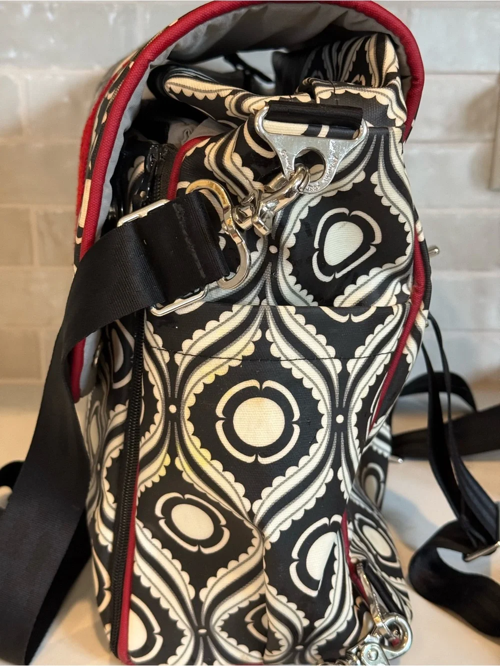 Petunia Pickle Bottom Black & White Geometric Baby Bag with Red Accent